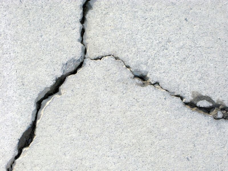 What Causes Concrete Cracks, Spalling, And Surface Damage